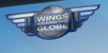 The logo of the Wings Around the Globe.