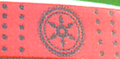 Symbol: A wheel shaped like a flower, that is drawn on the students' red headbands.